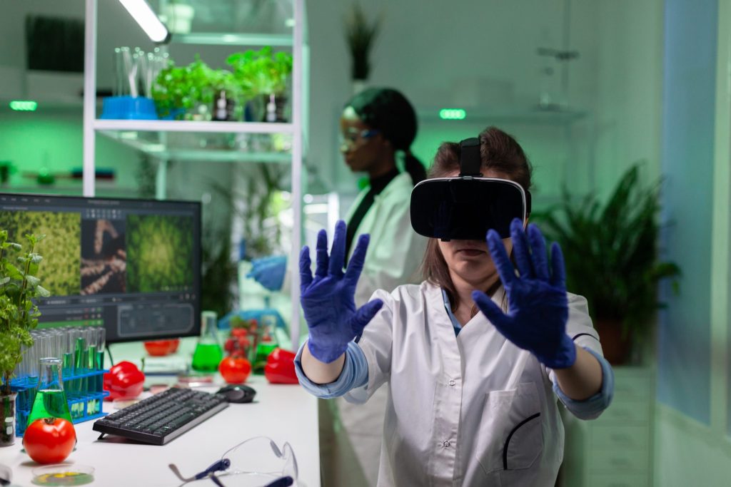 portrait biologist researcher woman analyzing virtual gmo plants expertise scaled.jpg
